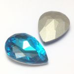 Kaboszon 25x18x7mm szklany fasetowany blue turquoise - 1 szt