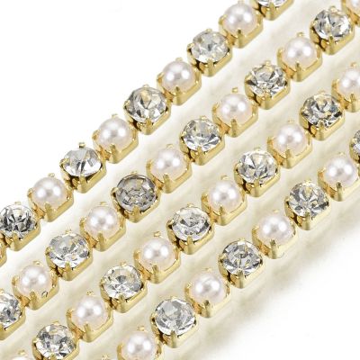 Taśma z kryształkami i perełkami 2 mm crystal/pearl / gold - 25cm