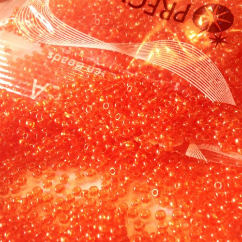 Rocaille 10/0 Czech seed beads - Transparent Satin Lt.  Lined Pumpkin 90030 - 10 gram