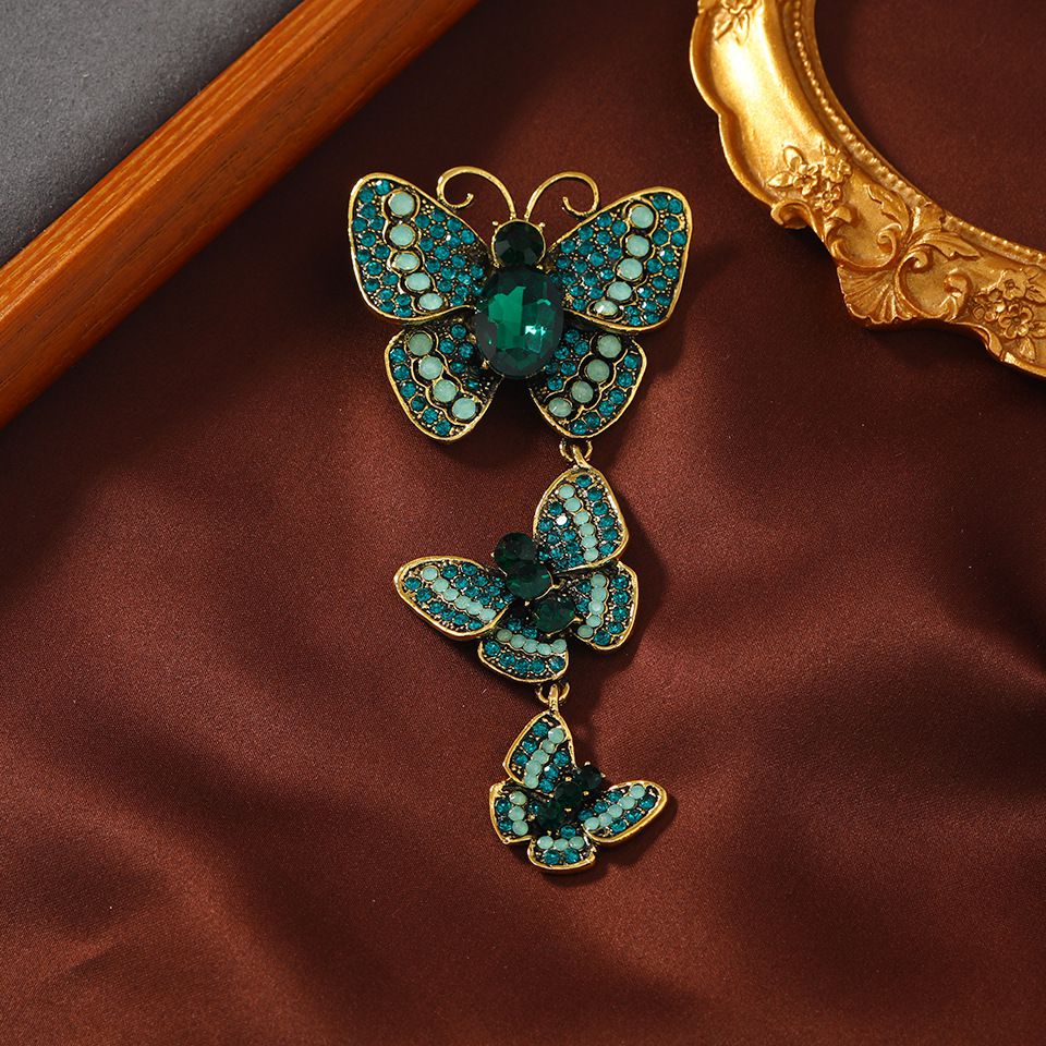 Broszla Motyle 110x52mm, 3-częściowa z kryształkami , - kolor złoty, zelony , turkusowy - 1 szt